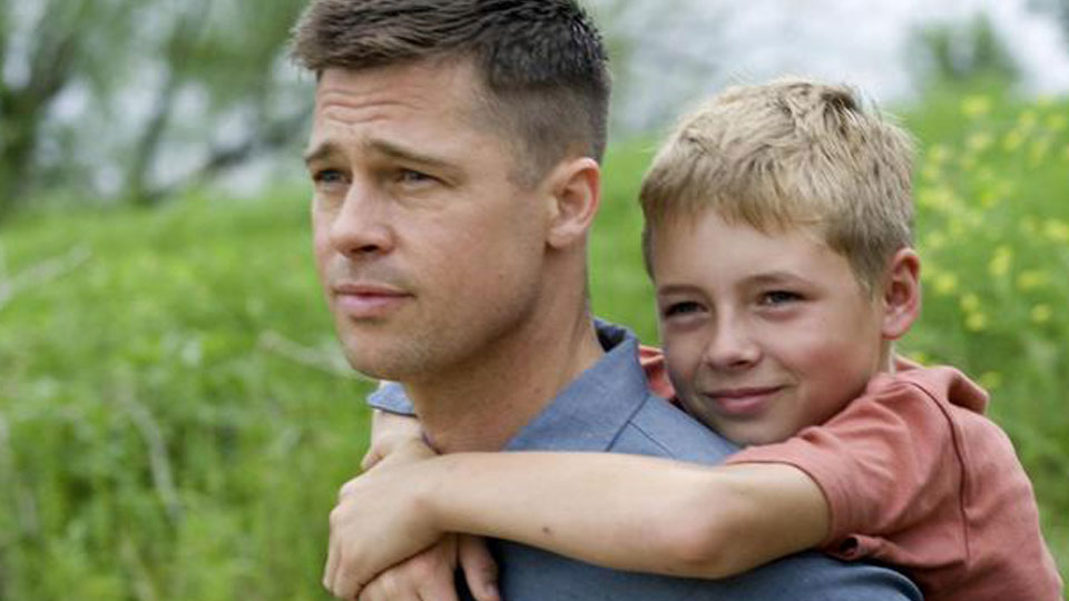 Mr Obrien (Brad Pitt) und R. L. (Laramie Eppler)